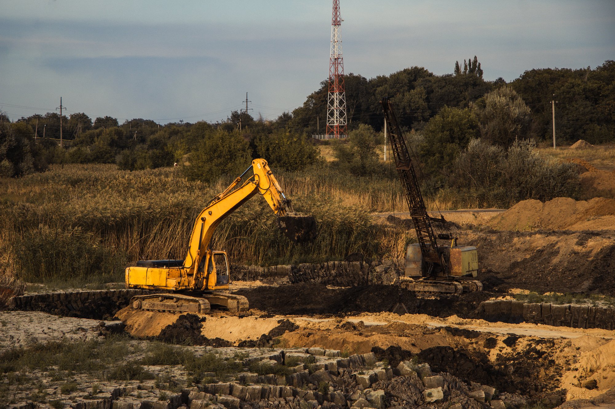 closeup-shot-ongoing-construction-with-tracks-bulldozer-abandoned-land